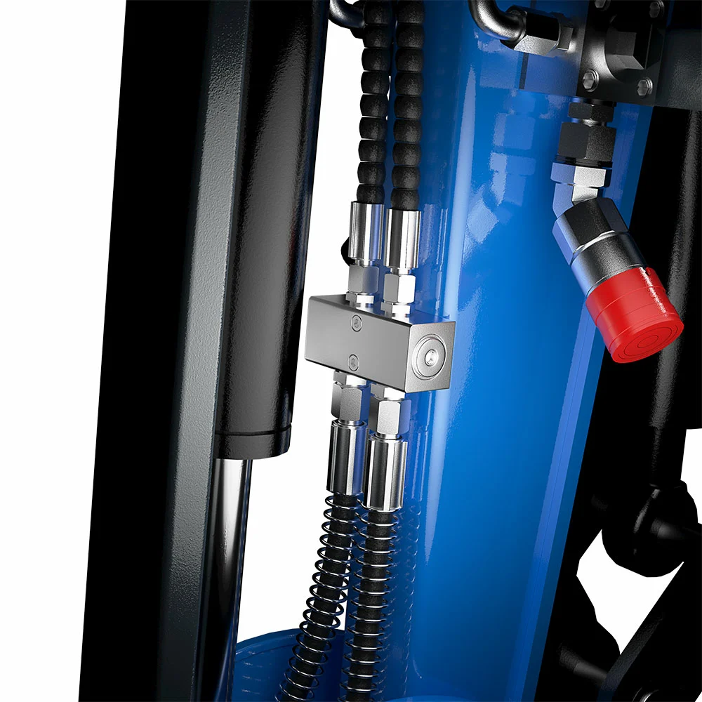 Raccords de ligne hydraulique auxiliaire sur le bras d'une mini-pelle